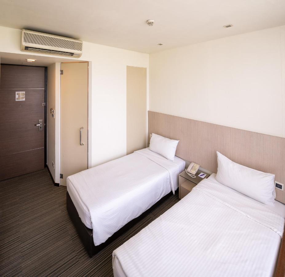 Aqueen Hotel Lavender Singapur Habitación foto